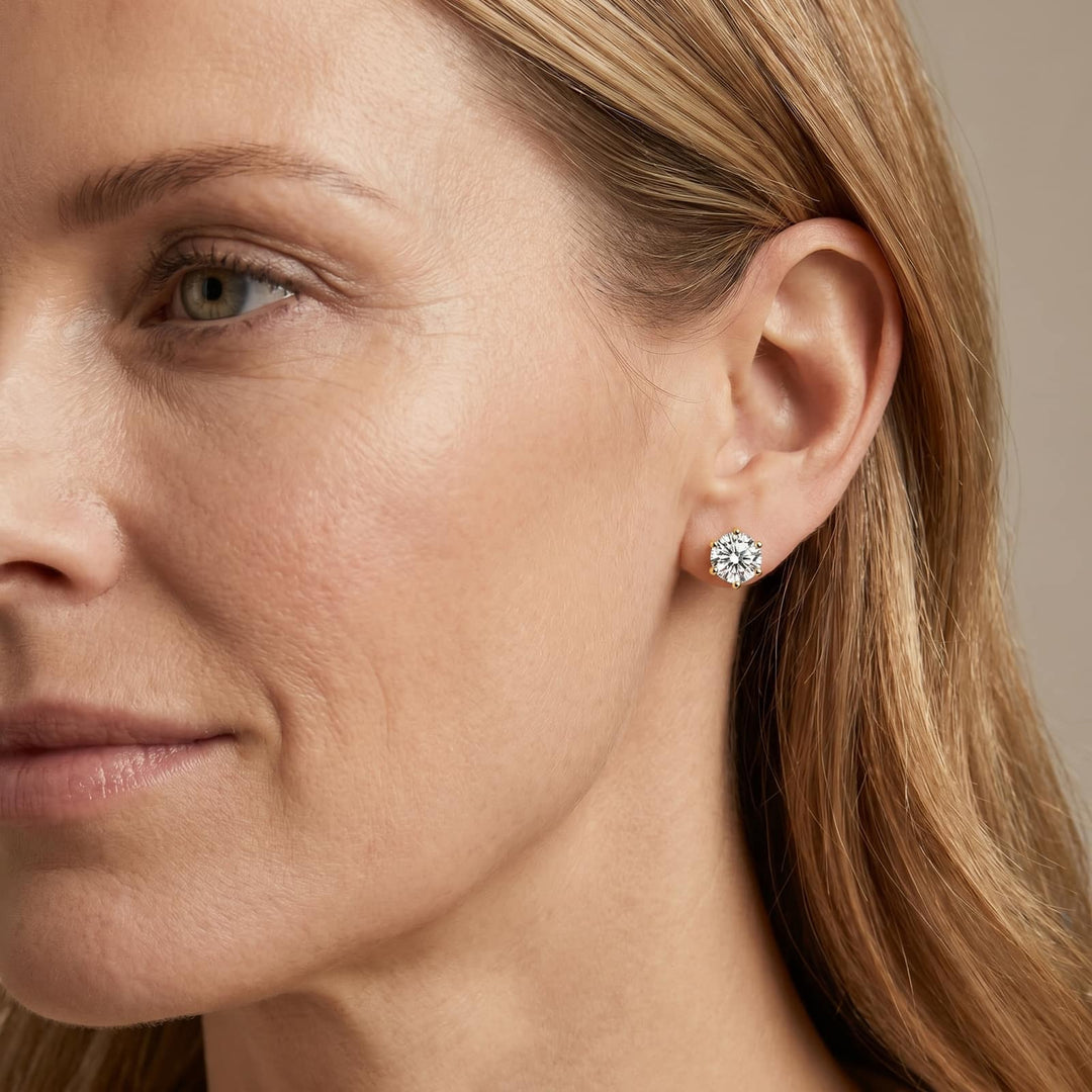 Worn - gold solitaire stud earrings