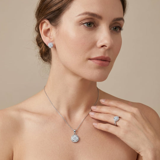 Woman wearing the Stockholm Moissanite Swirl Halo Set