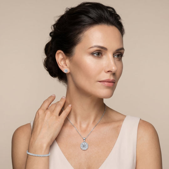 Woman wearing the Miami Swirl Silver Set