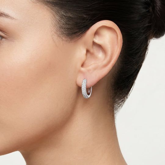 Vienna Moissanite Pave Huggie Earrings worn on ear