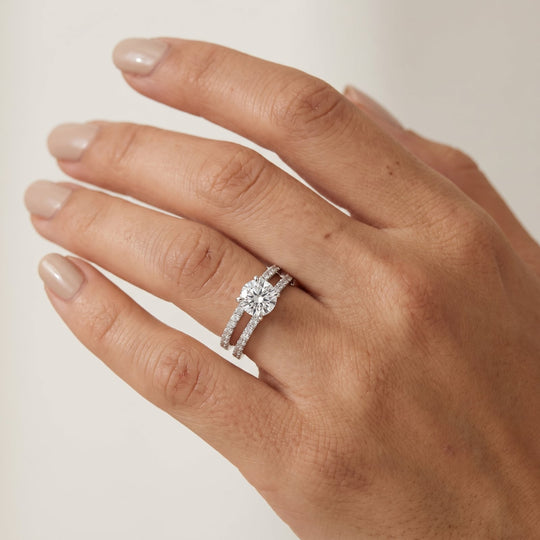 Zermatt Moissanite Solitaire Ring with band worn on hand